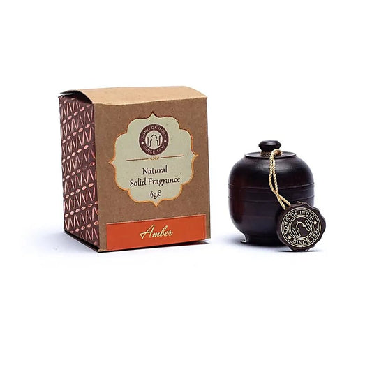 Perfume sólido Ámbar en madera de palisandro
